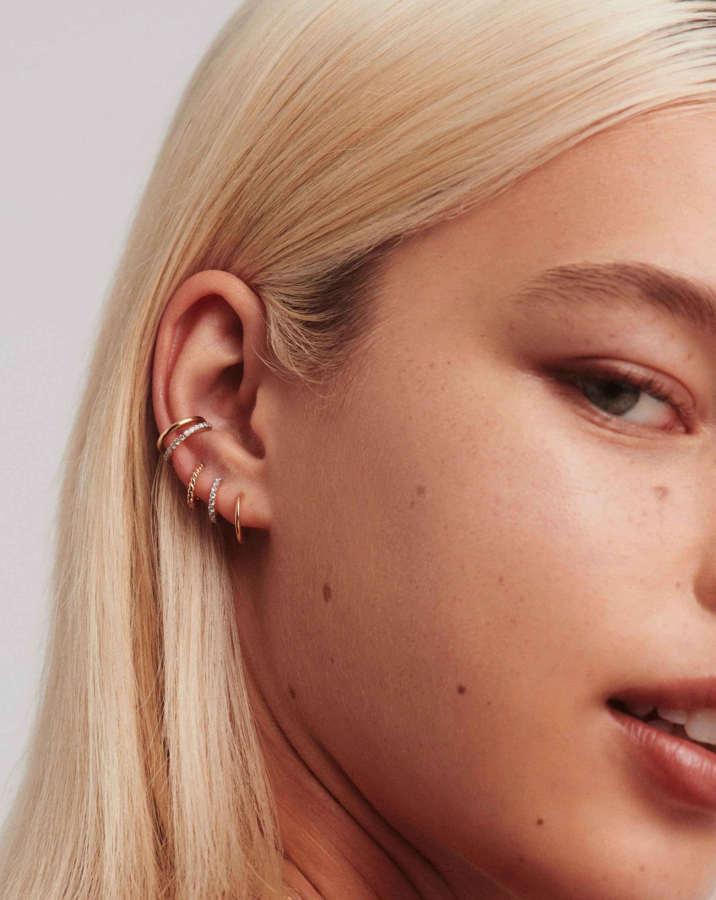 Solid Gold Classic Mini Hoop Earrings - Image 6