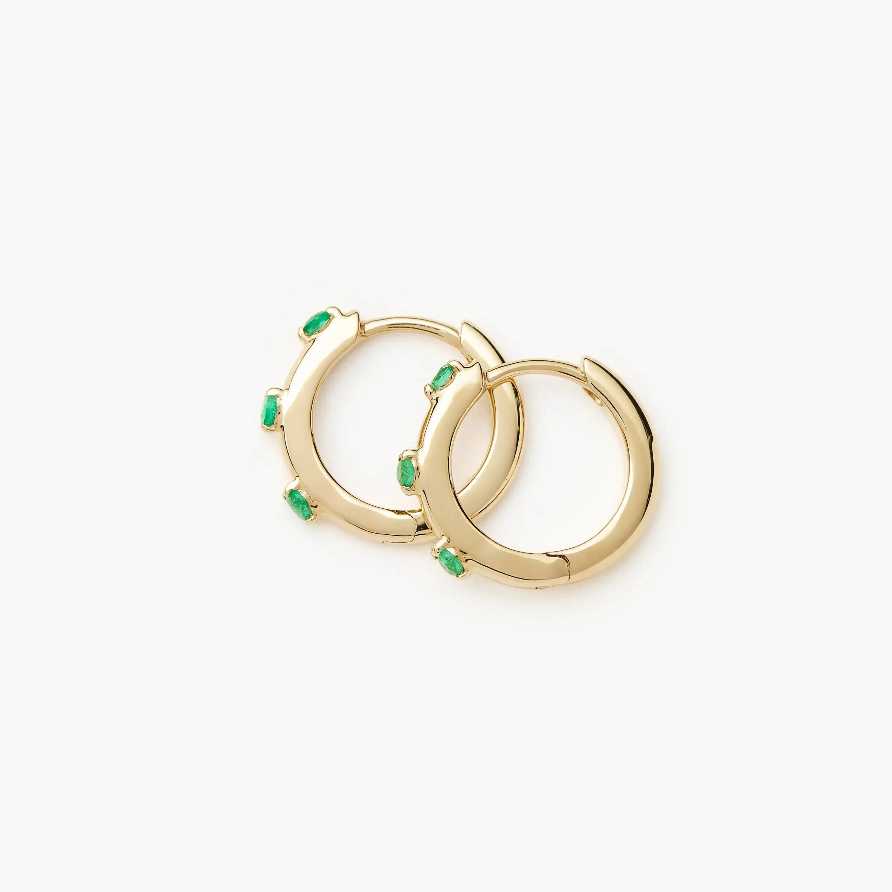 Solid Gold Emerald Studded Huggies | 14k Yellow Gold