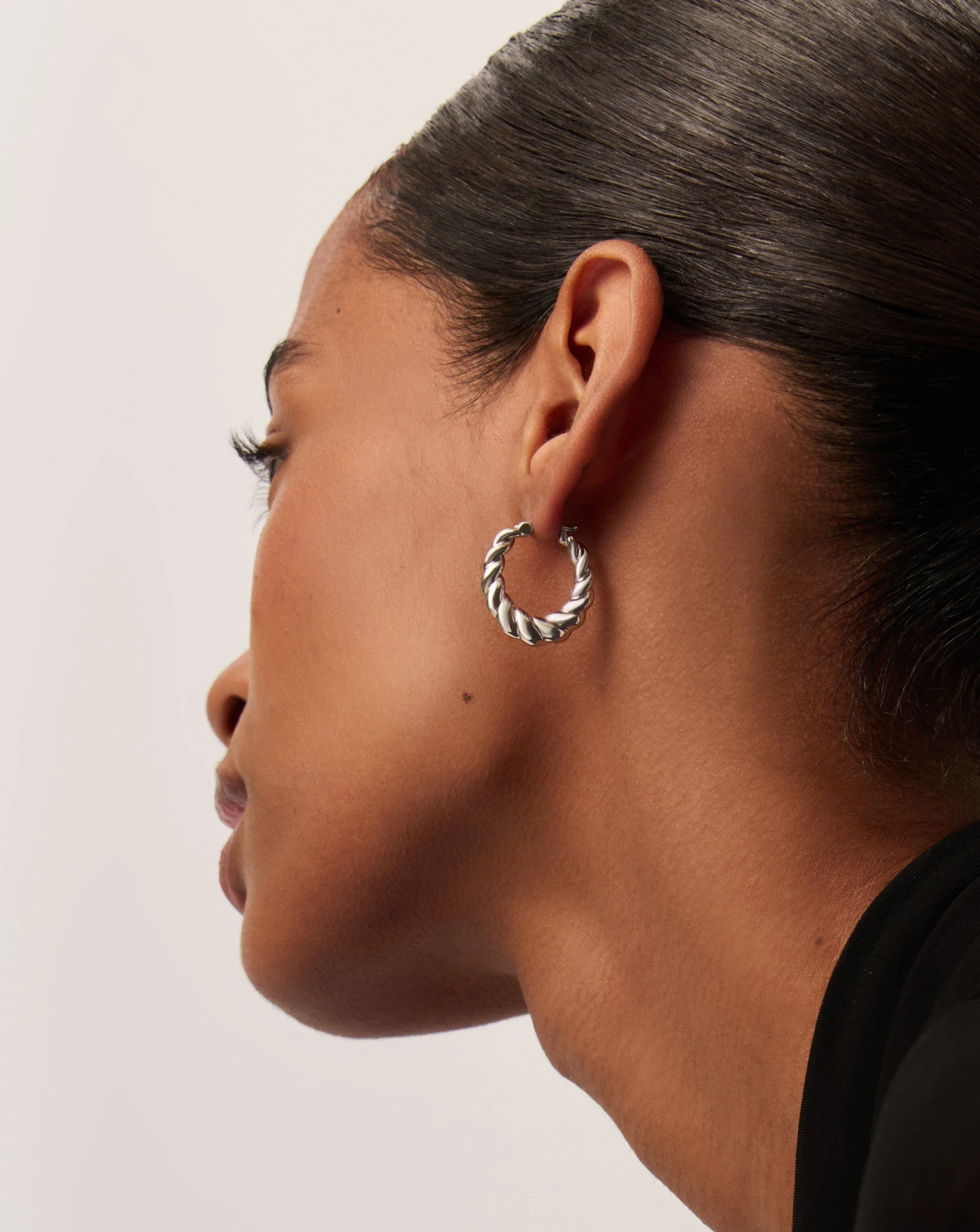 Twisted Tidal Medium Hoop Earrings | Silver Plating on Brass - Image 3